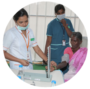 Free Medical Checkup Camp By Vikasa Tarangini Doctor Examining Patient