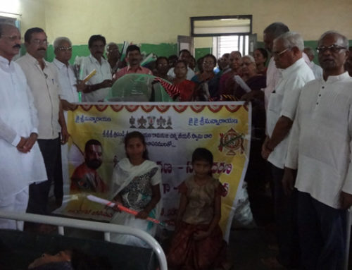Karimnagar Vikasa Tarangini Distributed Mufflers, Mosquito Protection Umbrellas and Fruits in Govt Civil Hospital