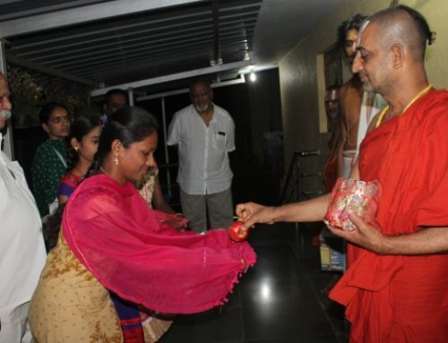 An Enthusiastic Volunteer Raising Funds for Blind Students by Putting Mehandi