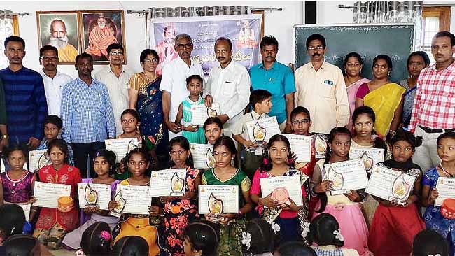 Rajam Vikasa Tarangini group conducted Compitation in Moral poems copy