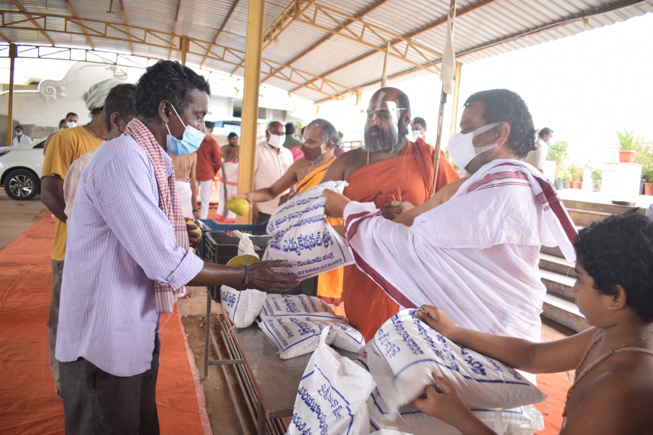 HH Swamiji distributes dry groceries to the needy at VijayaKiladri